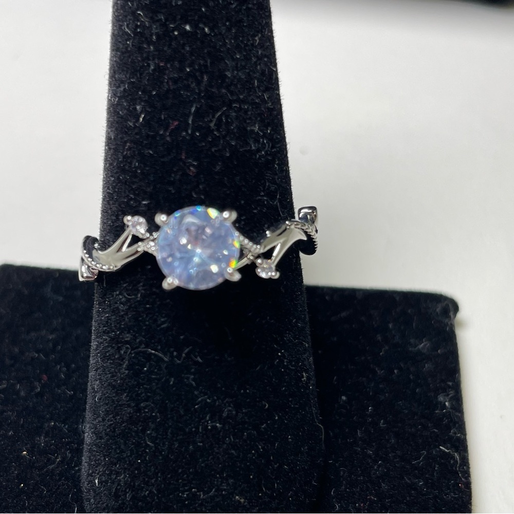 Elegant Silver Tone Ring with Light Blue Solitaire Center Size 8.5